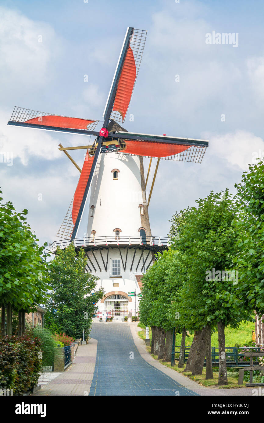 Streetscene with traditional windmill in town of Willemstad, North Brabant, Netherlands Stock Photo