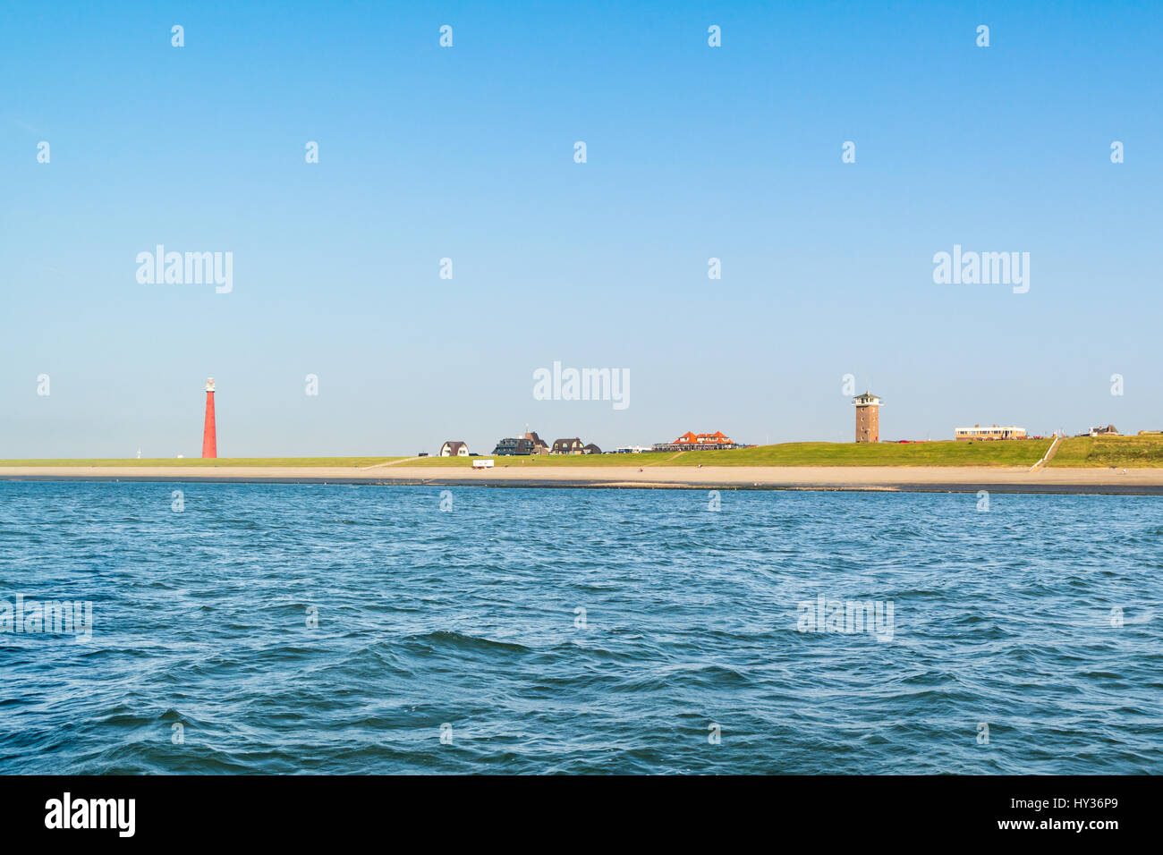 Lighthouse Lange Jaap at North Sea coast of Huisduinen near Den Helder, Netherlands Stock Photo