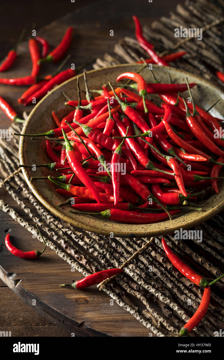 Raw Organic Red Thai Peppers in a Bowl Stock Photo