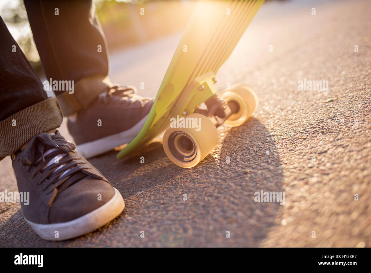 Sweden, Feet of man with skateboard Stock Photo