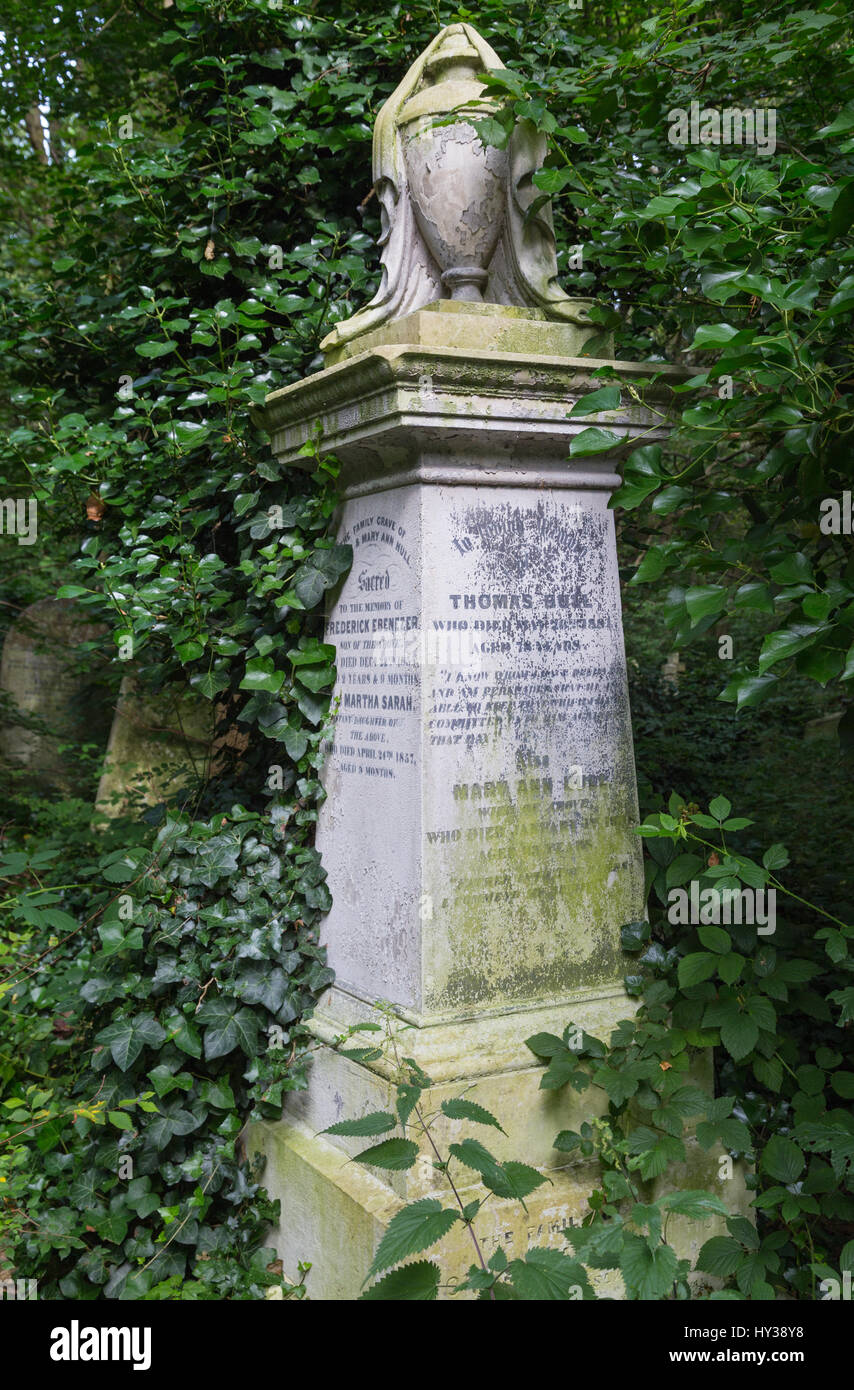 Victorian gravestone in Abney Park cemetery in summer in Stoke
