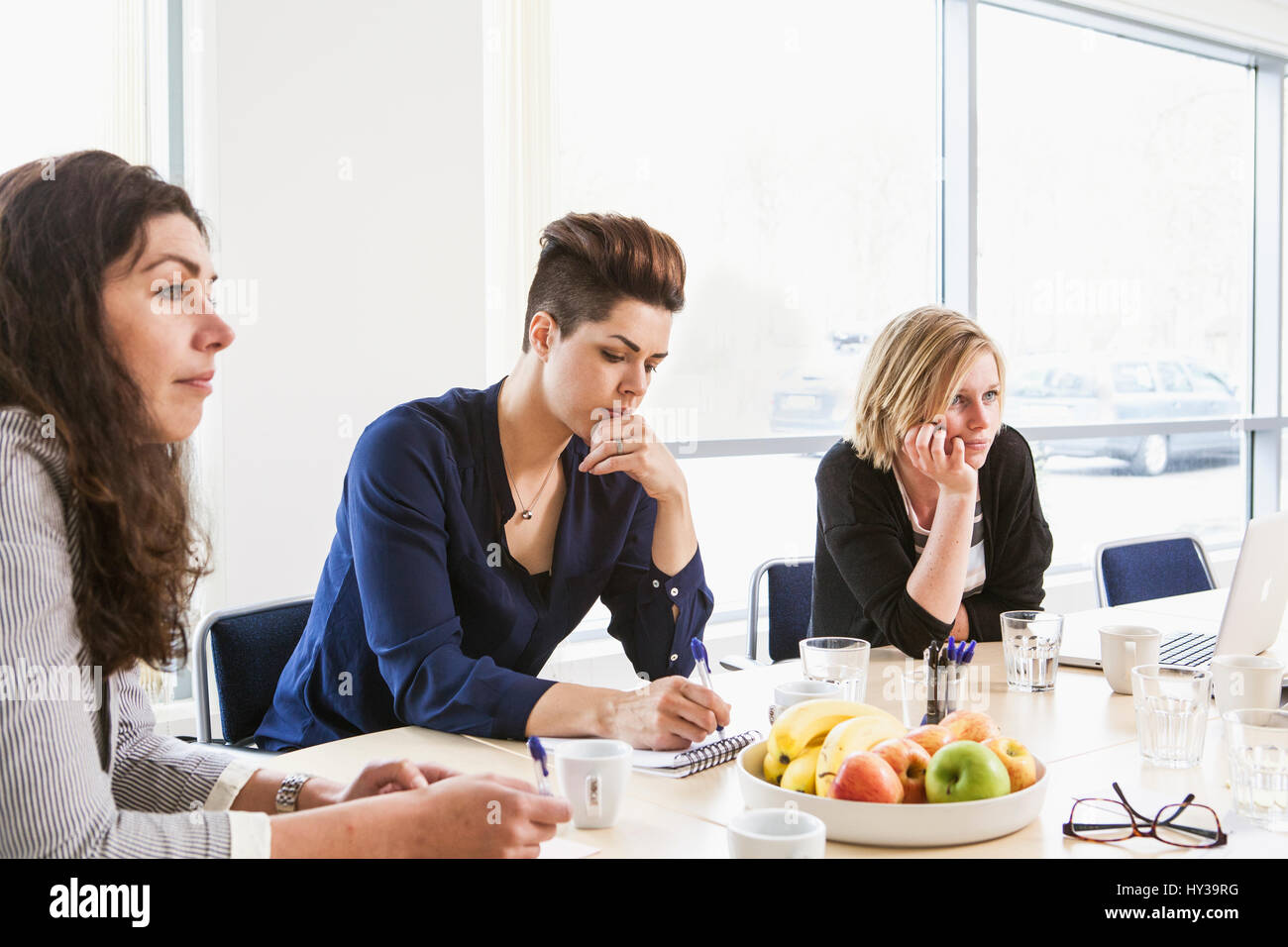 Sweden, Women concentrating on discussion Stock Photo