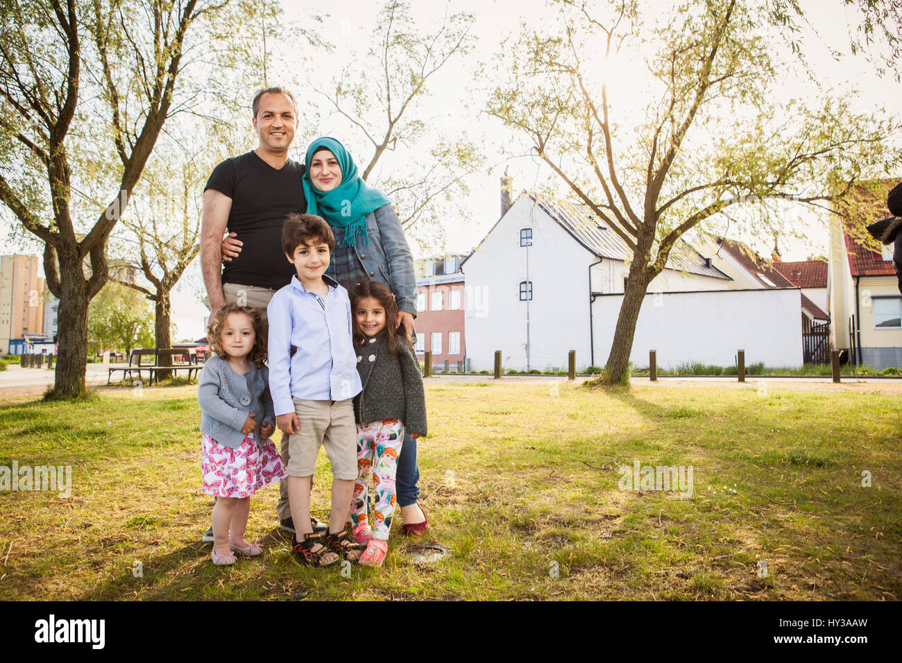 Sweden, Blekinge, Solvesborg, Family posing in park Stock Photo