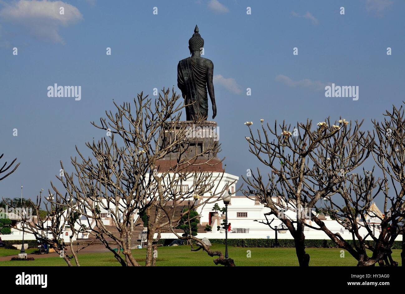 Salaya, Thailand - January 16, 2010:   A colossal walking Buddha statue dominates Phra Phutthamonthon Buddhist park Stock Photo