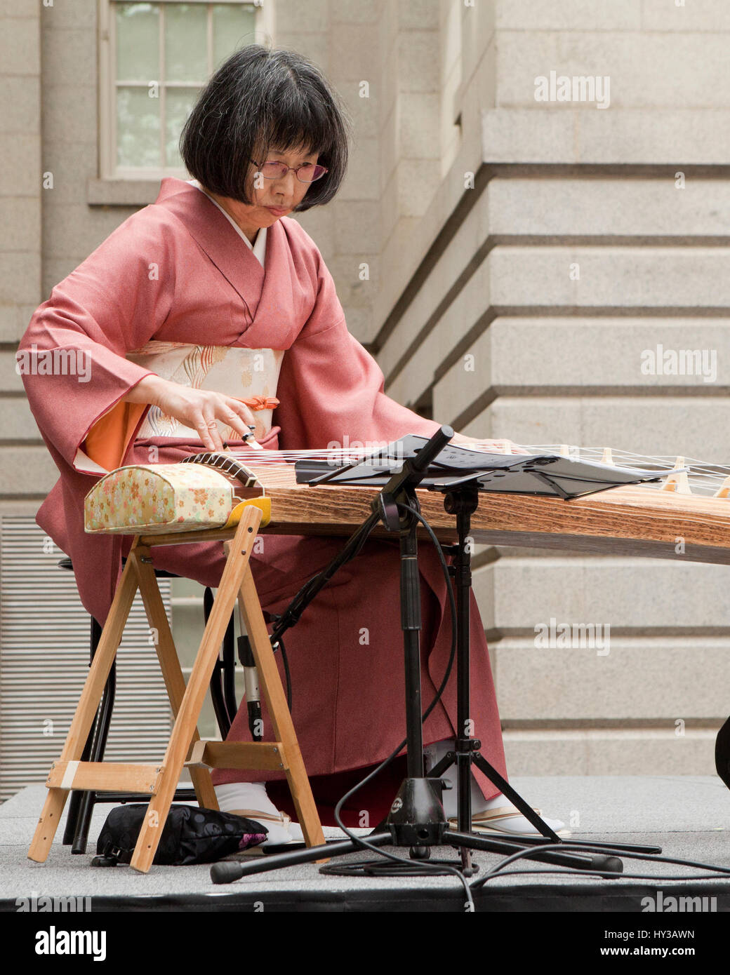 Japanese Koto player during the National Cherry Blossoms Festival - Washington, DC USA Stock Photo