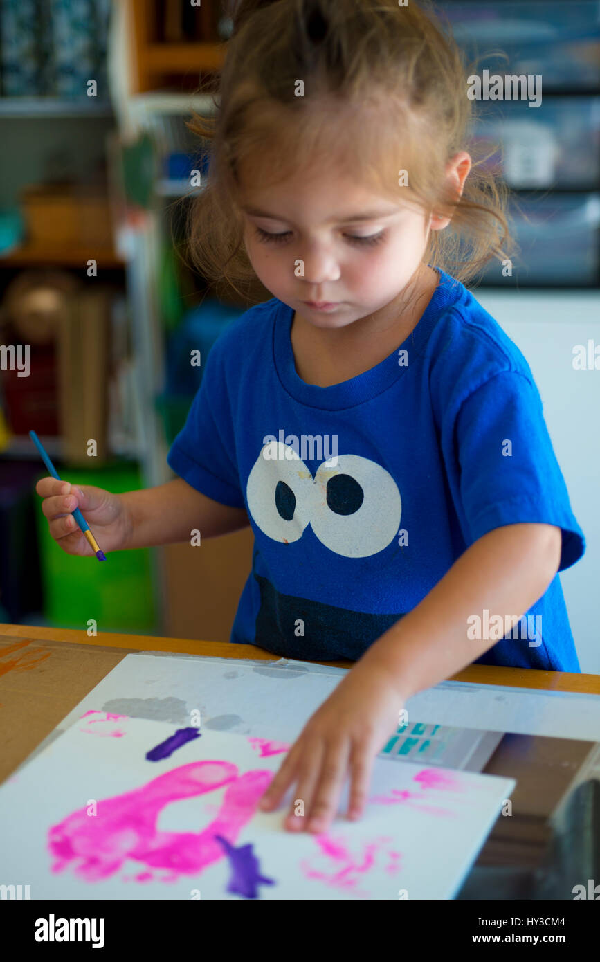 little girl painting Stock Photo Alamy