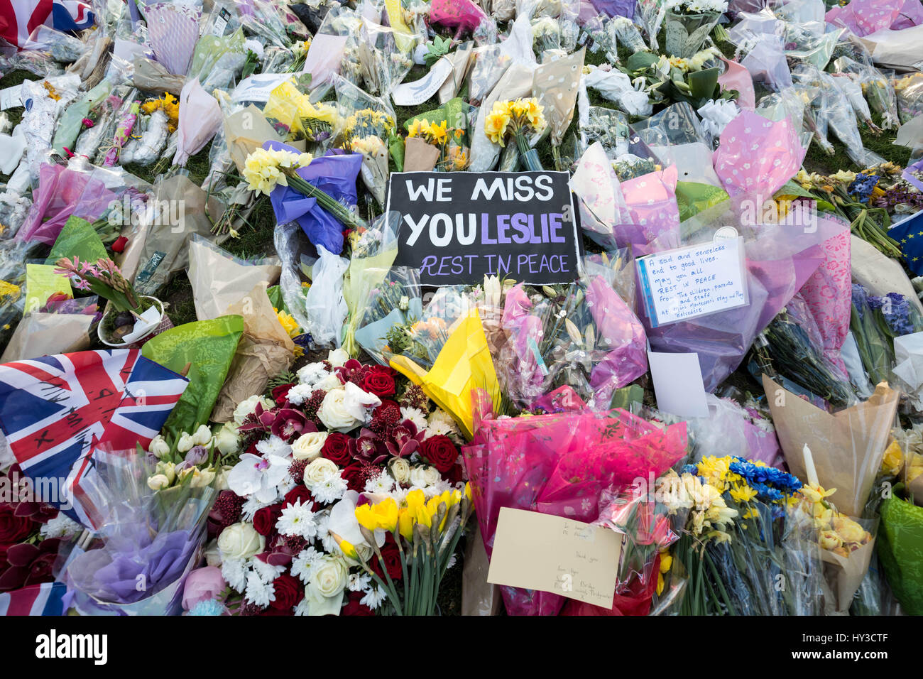 Floral tributes are laid out in Westminster, London in remembrance of the victims of the terror attack on 22nd March 2017 which claimed four lives including a Metropolitan police officer, PC Keith Palmer. Stock Photo