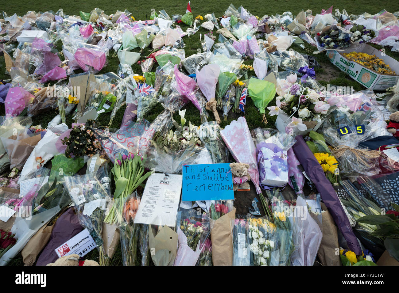 Floral tributes are laid out in Westminster, London in remembrance of the victims of the terror attack on 22nd March 2017 which claimed four lives including a Metropolitan police officer, PC Keith Palmer. Stock Photo