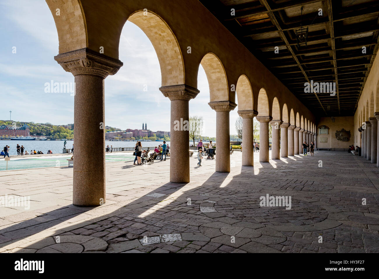 Sweden, Stockholm, City panorama seen from under Stockholm City Hall arcades Stock Photo