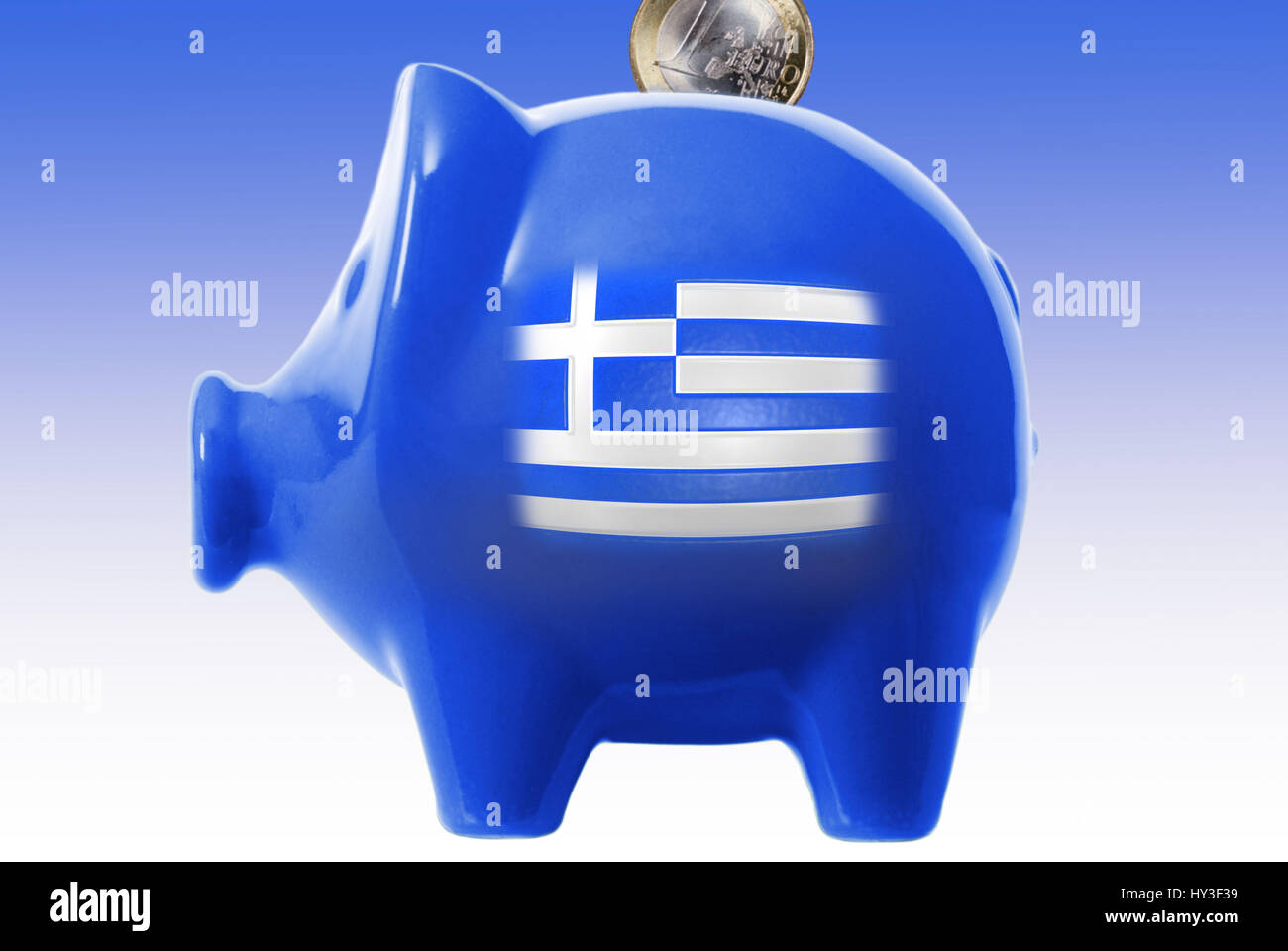 Piggy bank with Greek flag and euro-coin, savings course for Greece, Sparschwein mit griechischer Fahne und Euro-Münze, Sparkurs für Griechenland Stock Photo