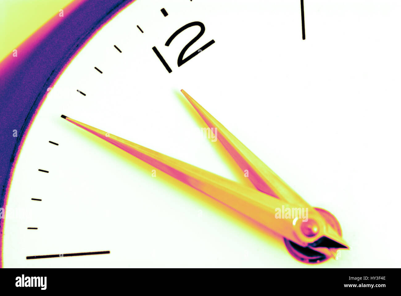 Clock shows Five before Twelve, Uhr zeigt Fünf vor Zwölf Stock Photo