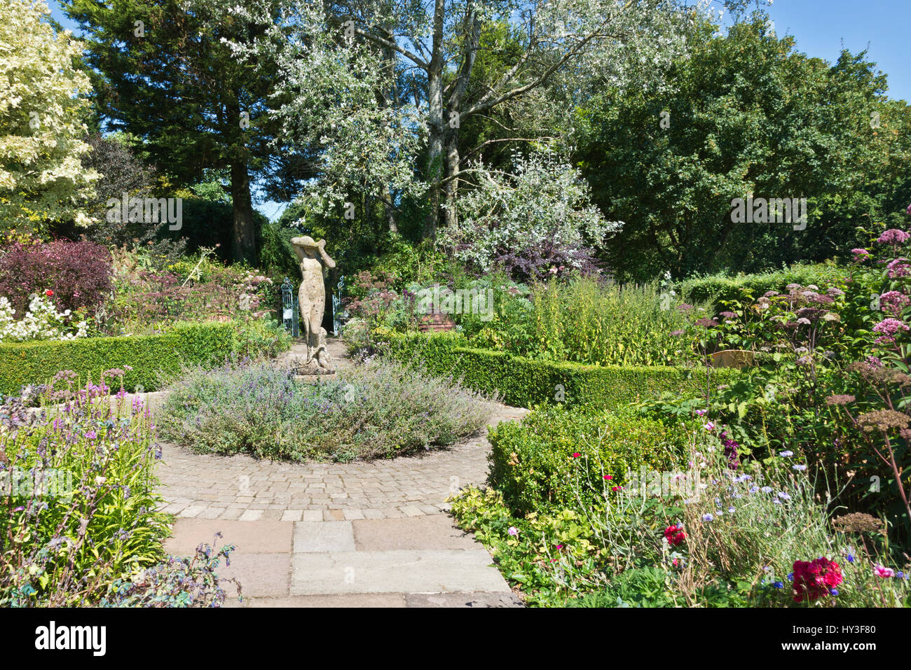 A view of the Shy Maiden statue in the Rose Garden at Burrow Farm