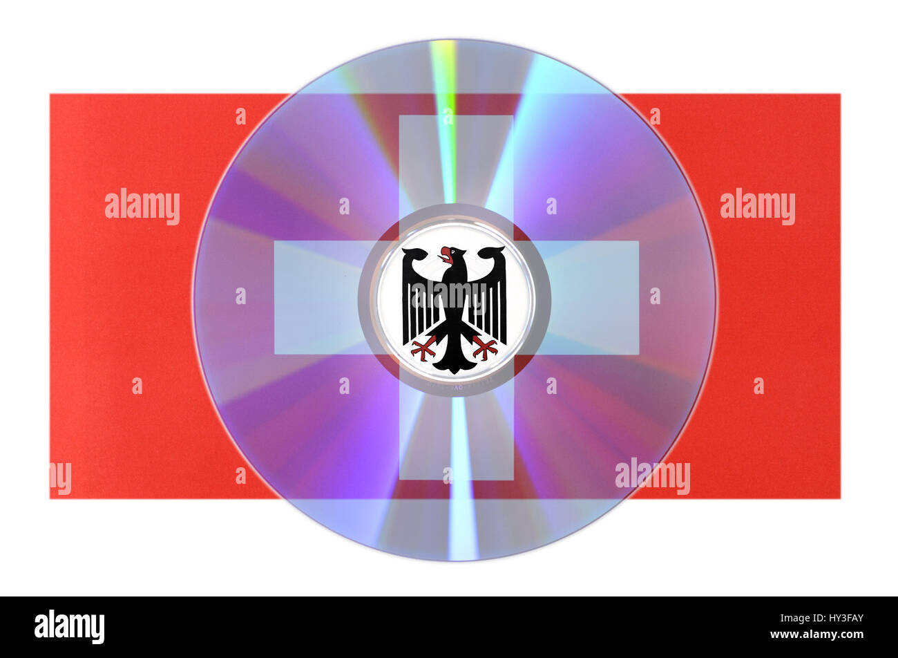 Data CD with German federal eagle on Swiss flag, sales of bank data, Daten-CD mit Deutschem Bundesadler auf Schweizer Fahne, Verkauf von Bankdaten Stock Photo
