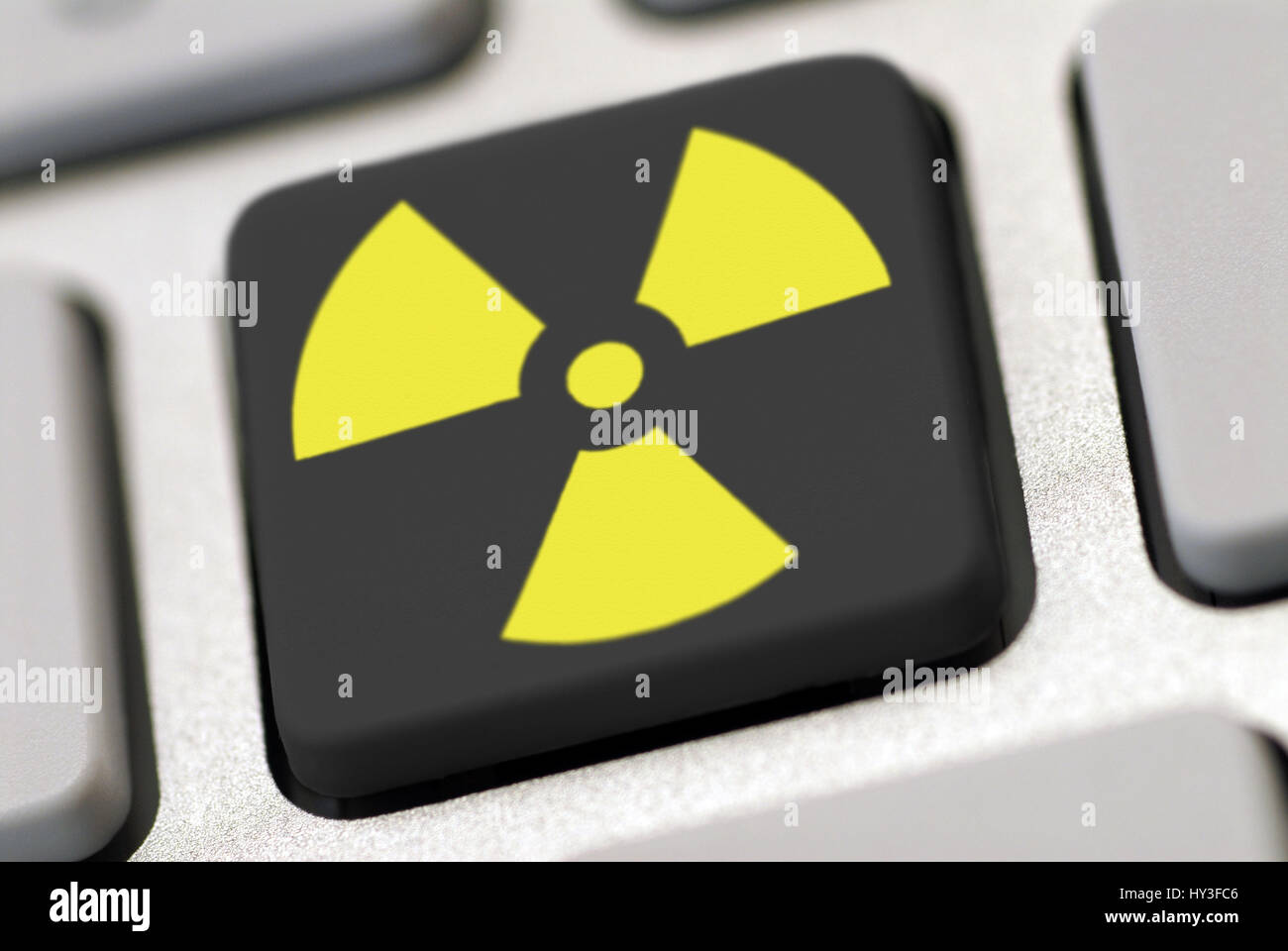 Radioactivity signs on a computer keyboard, Radioaktivitätszeichen auf  einer Computertastatur Stock Photo - Alamy