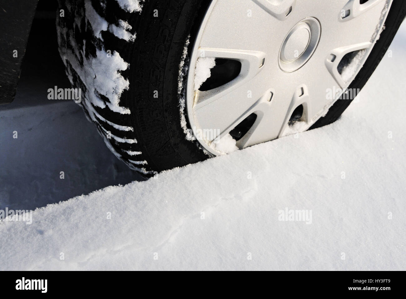 Tyres in the snow, Autoreifen im Schnee Stock Photo