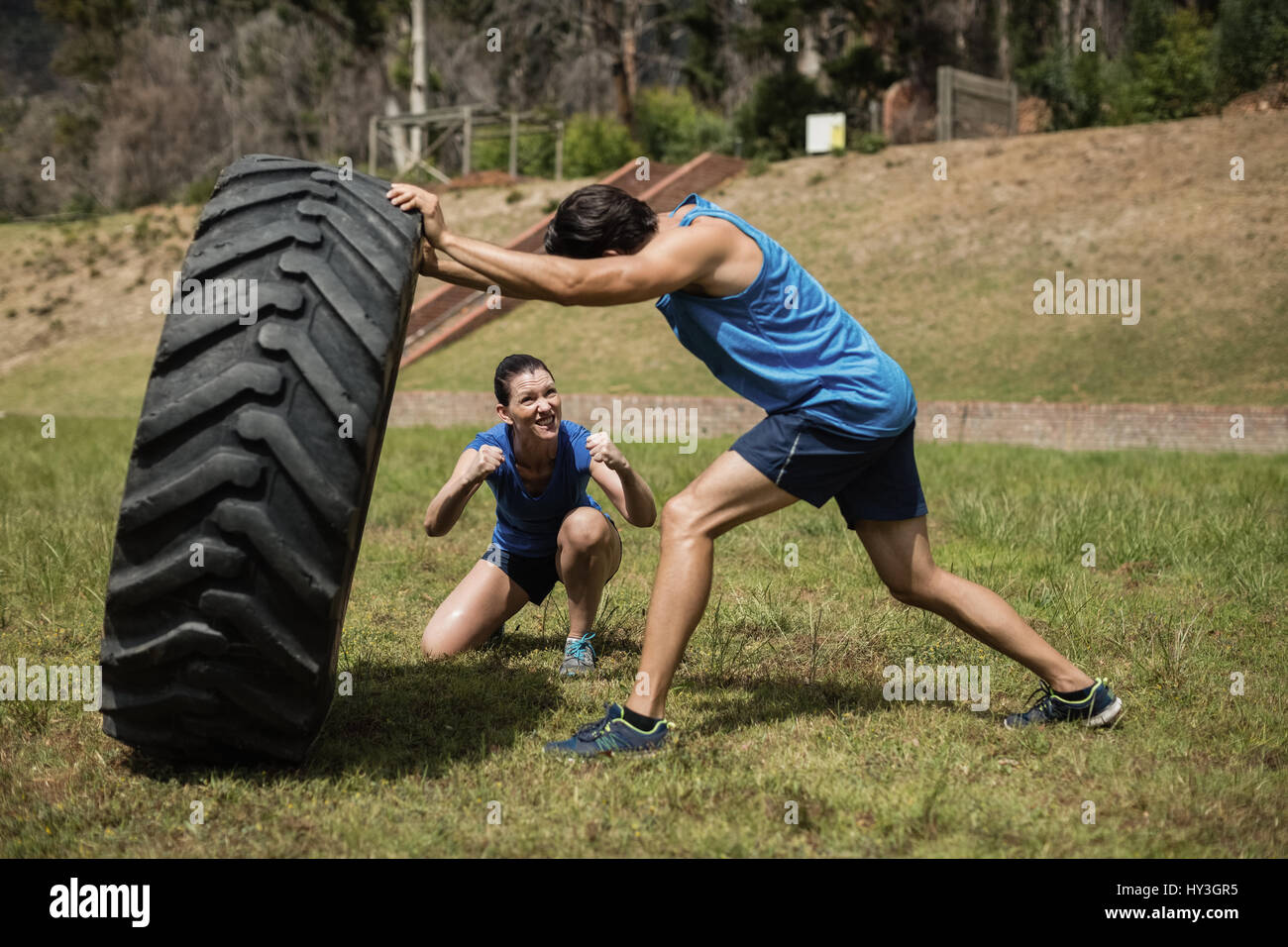 Man flipping tire hi-res stock photography and images - Alamy
