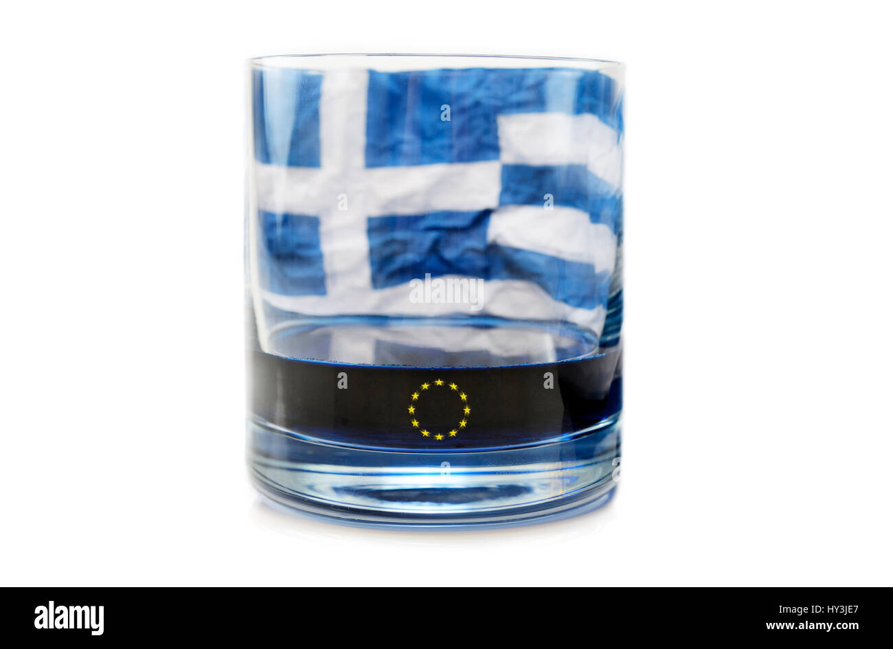 Half-empty glass with Greek flag, symbolic photo debt quarrel, Halbleeres Glas mit griechischer Fahne, Symbolfoto Schuldenstreit Stock Photo
