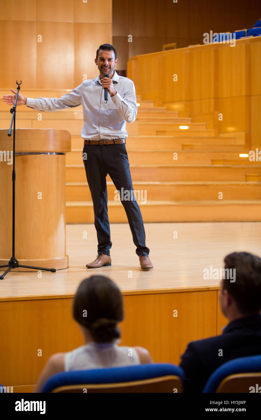 Woman podium giving speech hi-res stock photography and images - Alamy