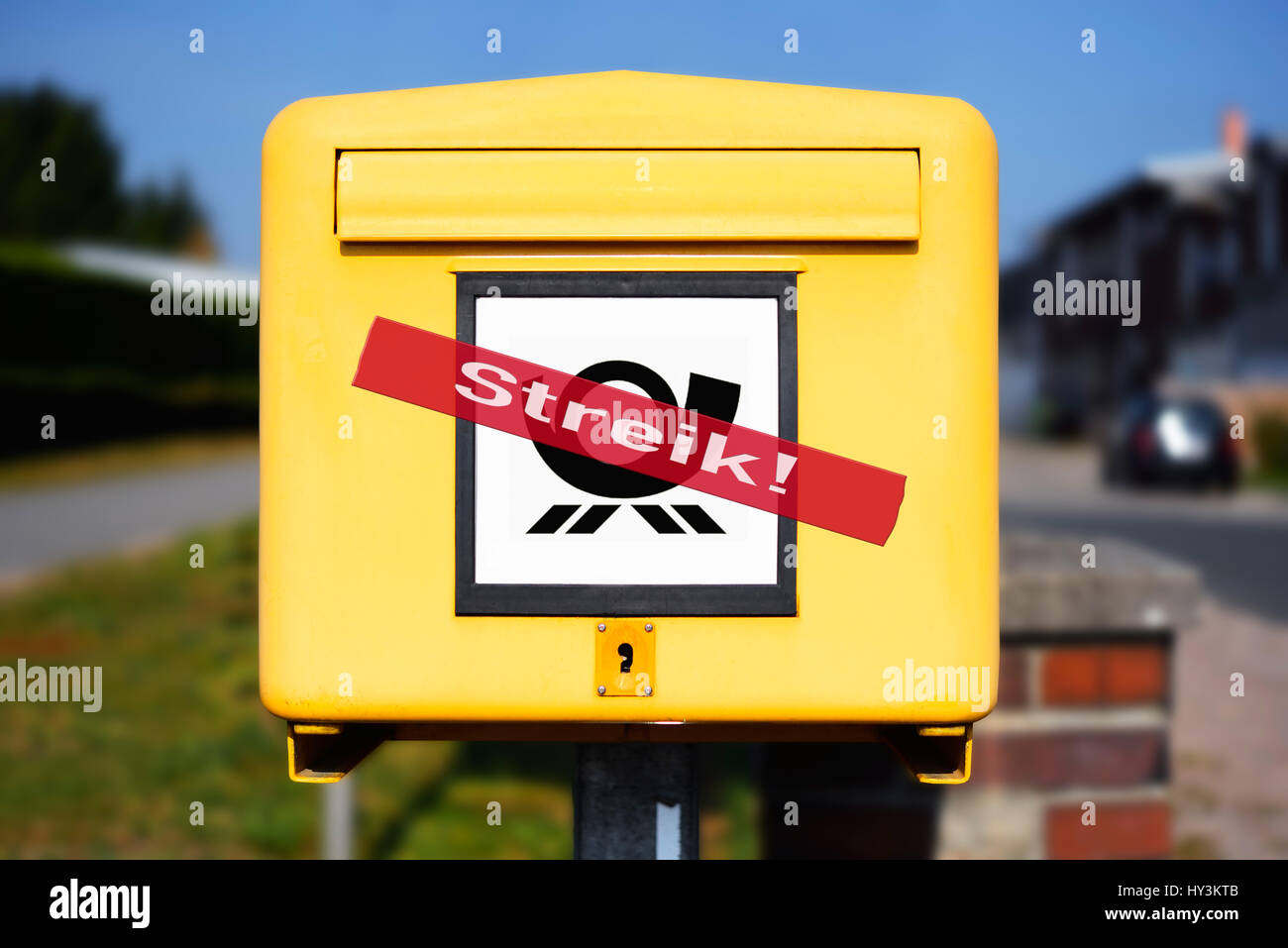 Mailbox with strike stroke, symbolic photo postal strike, Briefkasten mit Streik-Schriftzug, Symbolfoto Post-Streik Stock Photo