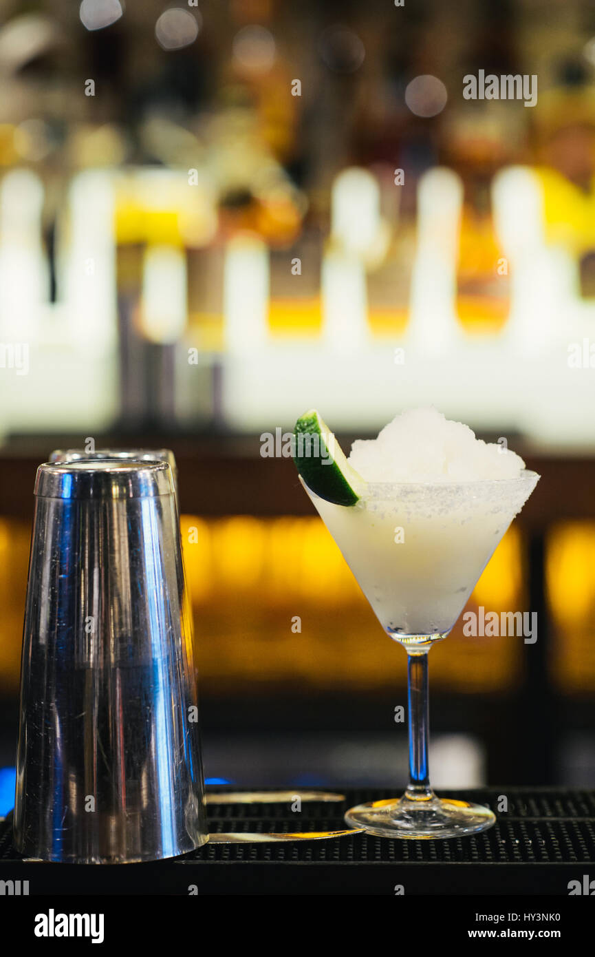 Glass of Margarita Cocktail on Crushed Ice Stock Photo