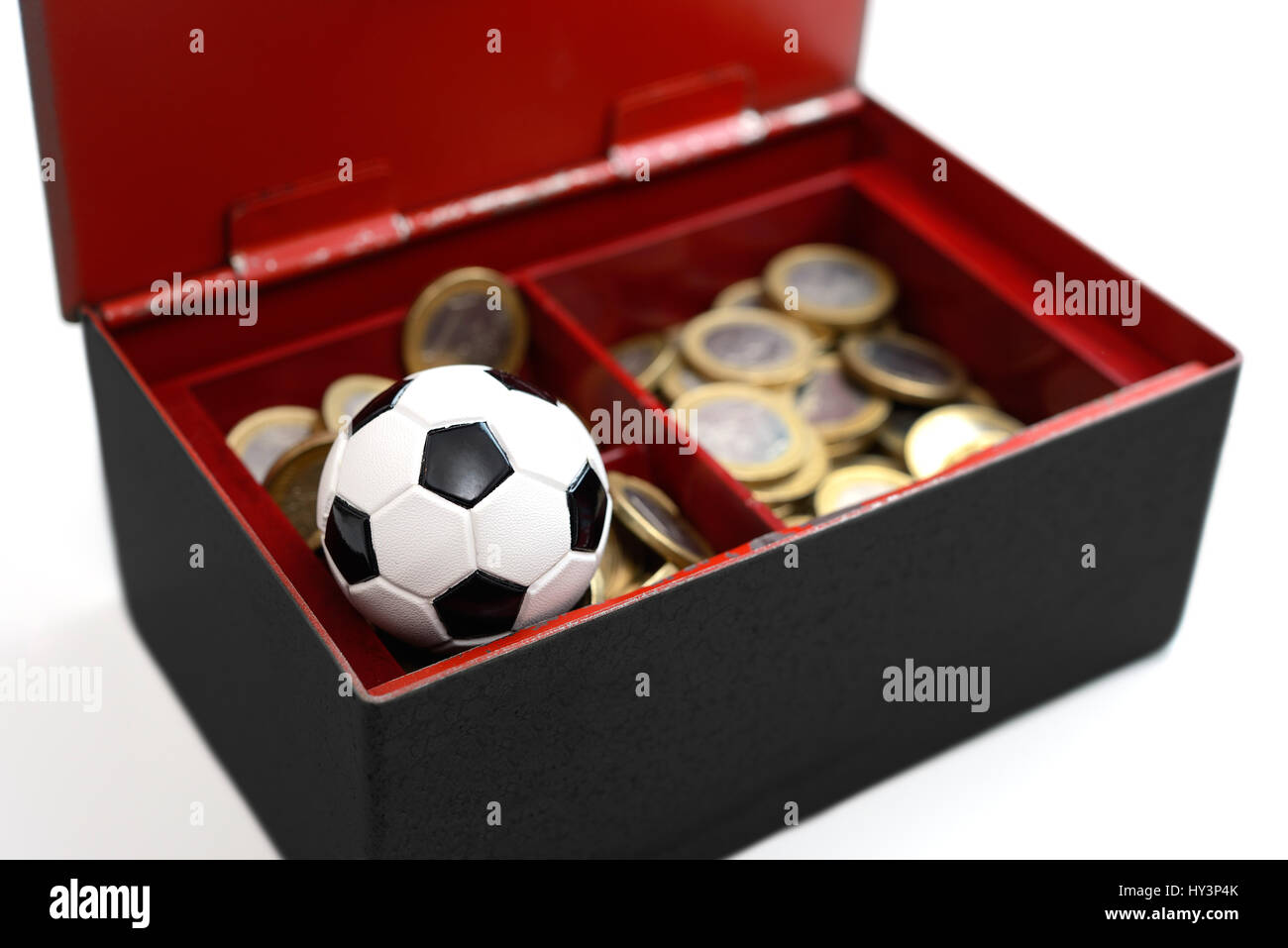 Black cash with miniature football, symbolic photo German Football Association scandal, Schwarze Kasse mit Miniaturfußball, Symbolfoto DFB-Skandal Stock Photo