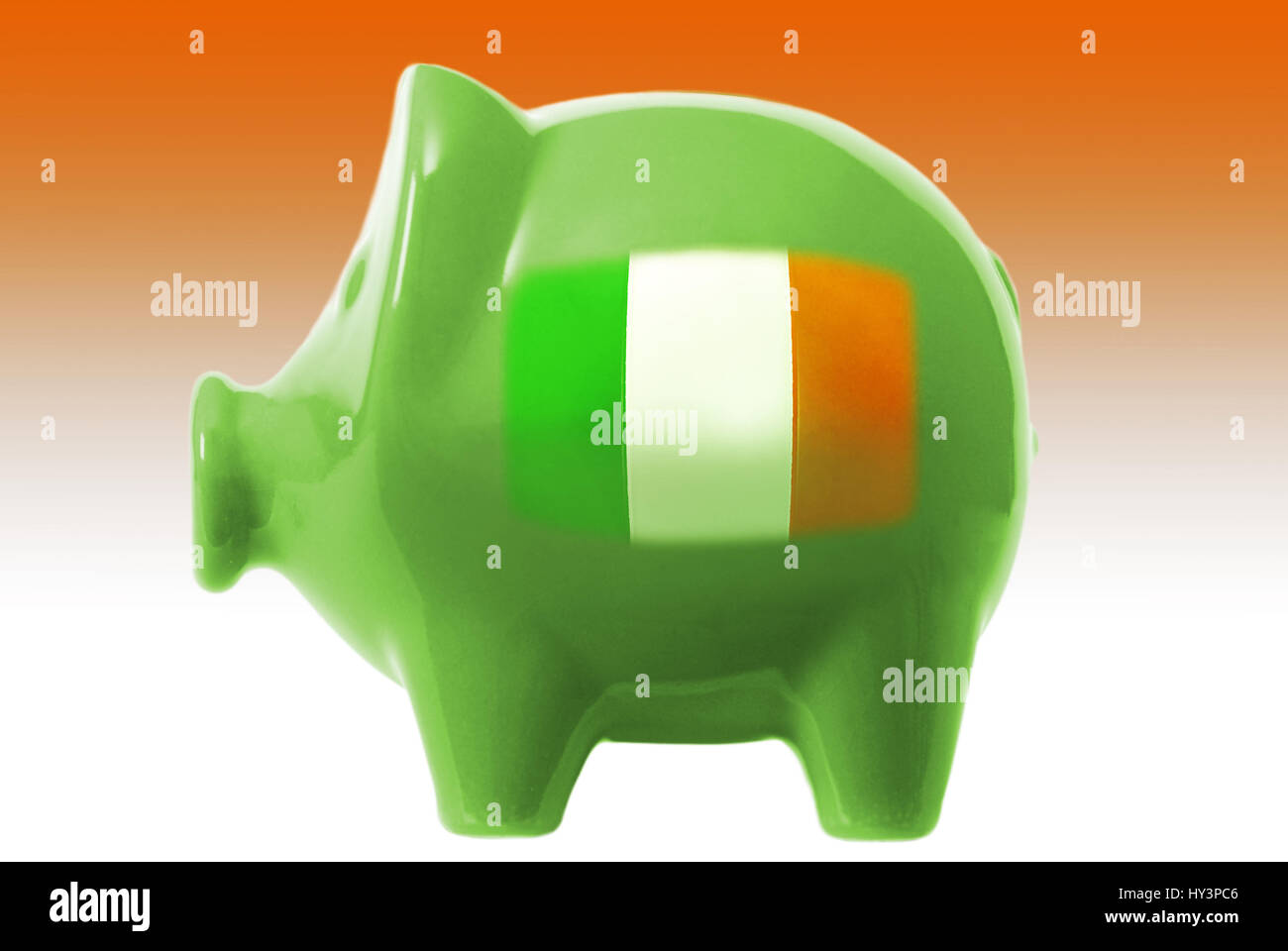 Piggy bank with the flag of Ireland, Sparschwein mit der Flagge von Irland Stock Photo