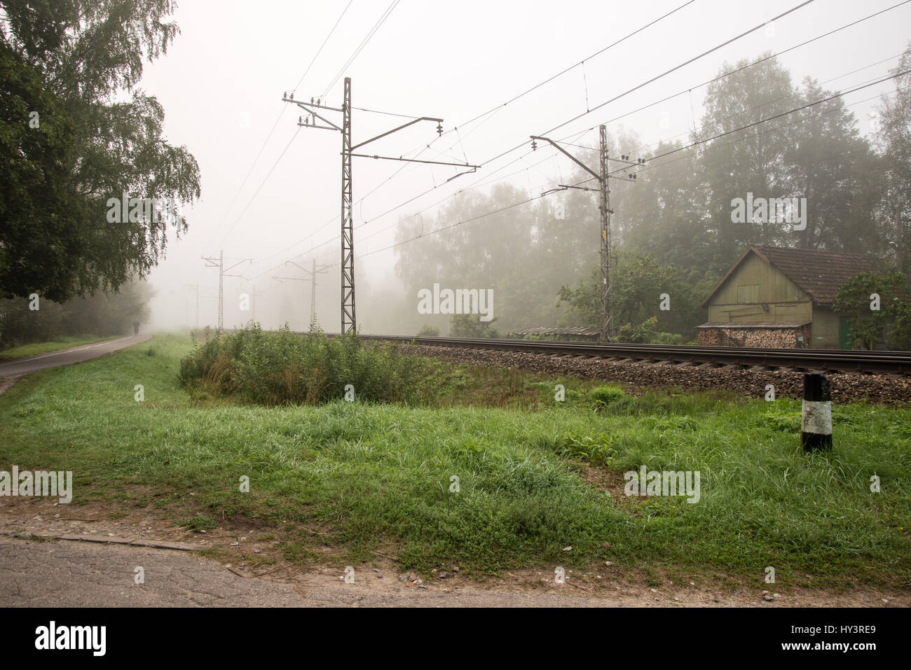 misty country road in the early morning Stock Photo - Alamy