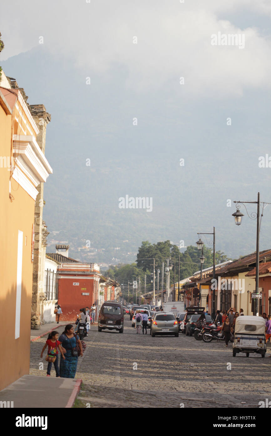 Streets in Antigua Guatemala tiny houses shops and people Stock Photo ...