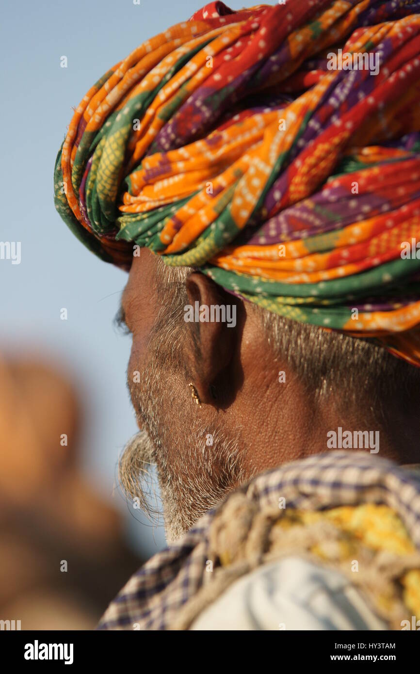 Man in colorful turban at the annual Camel Fair in Pushkar, Rajasthan, India. Stock Photo