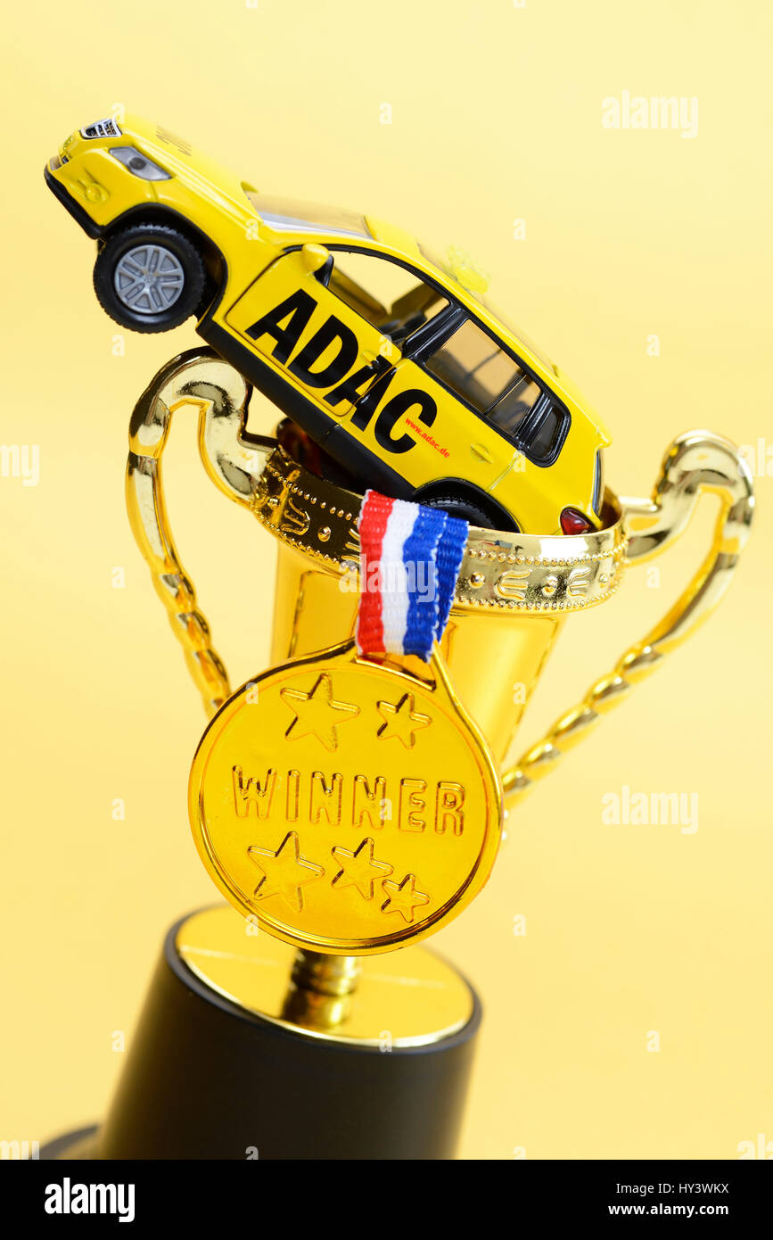 ADAC miniature vehicle, medallion and cup, manipulations with the ADAC price, ADAC Miniaturfahrzeug, Medaille und Pokal, Manipulationen beim ADAC-Prei Stock Photo