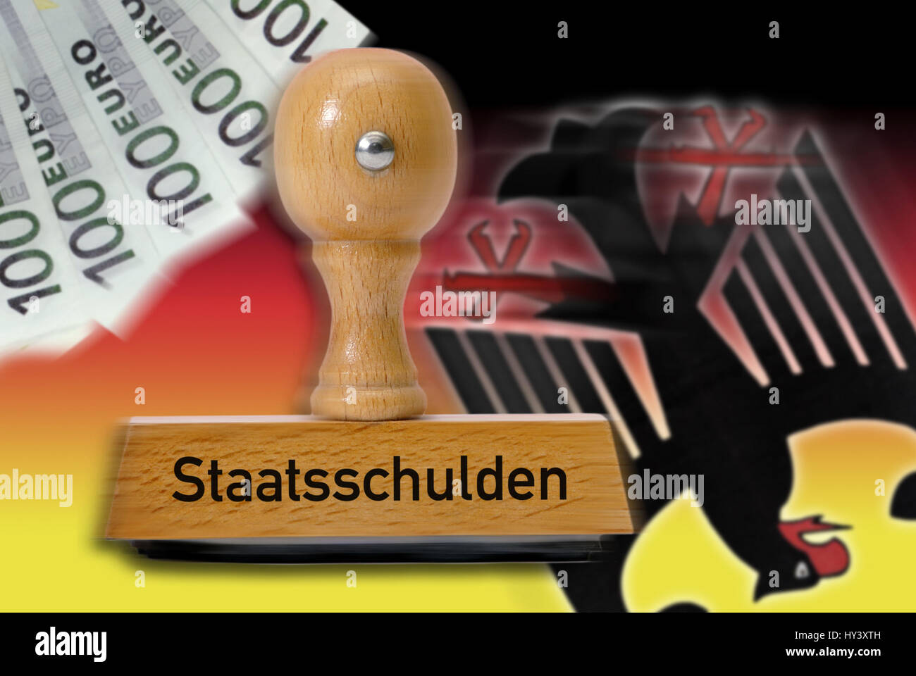 Stamp with the label National debts, German Federal eagle and National colours, Stempel mit der Aufschrift Staatsschulden, deutscher Bundesadler und N Stock Photo