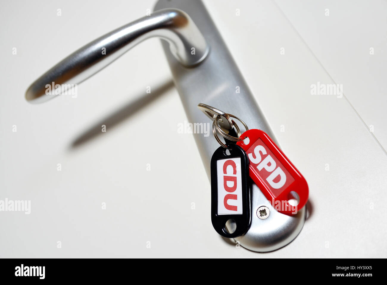 Key with key chain of CDU and SPD, symbolic photo grand coalition ...
