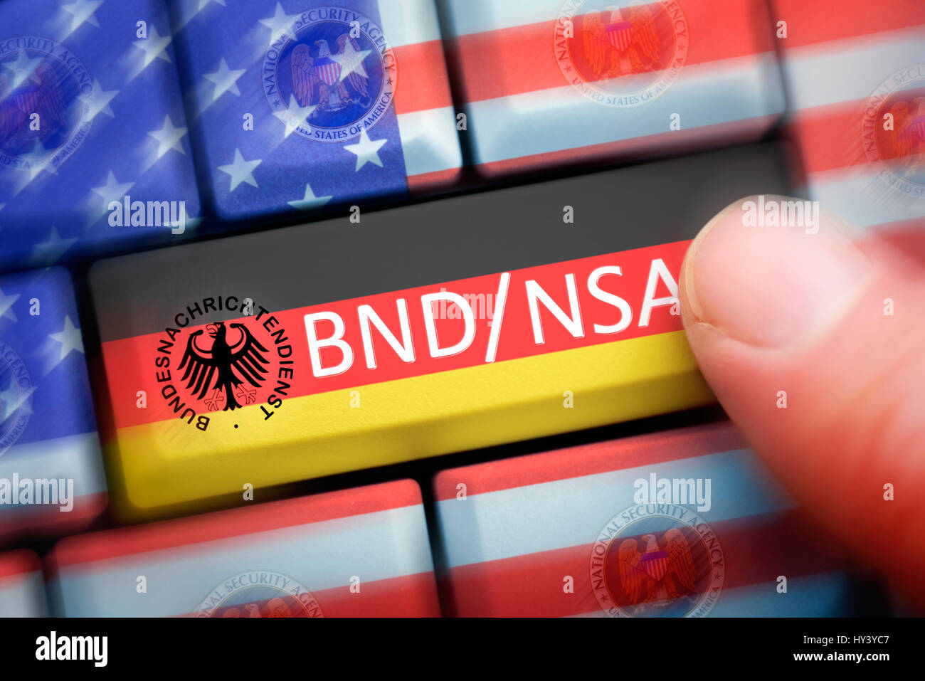 Finger on computer key with NSA and Federal Intelligence Service stroke, symbolic photo Federal Intelligence Service scandal, Finger auf Computertaste Stock Photo