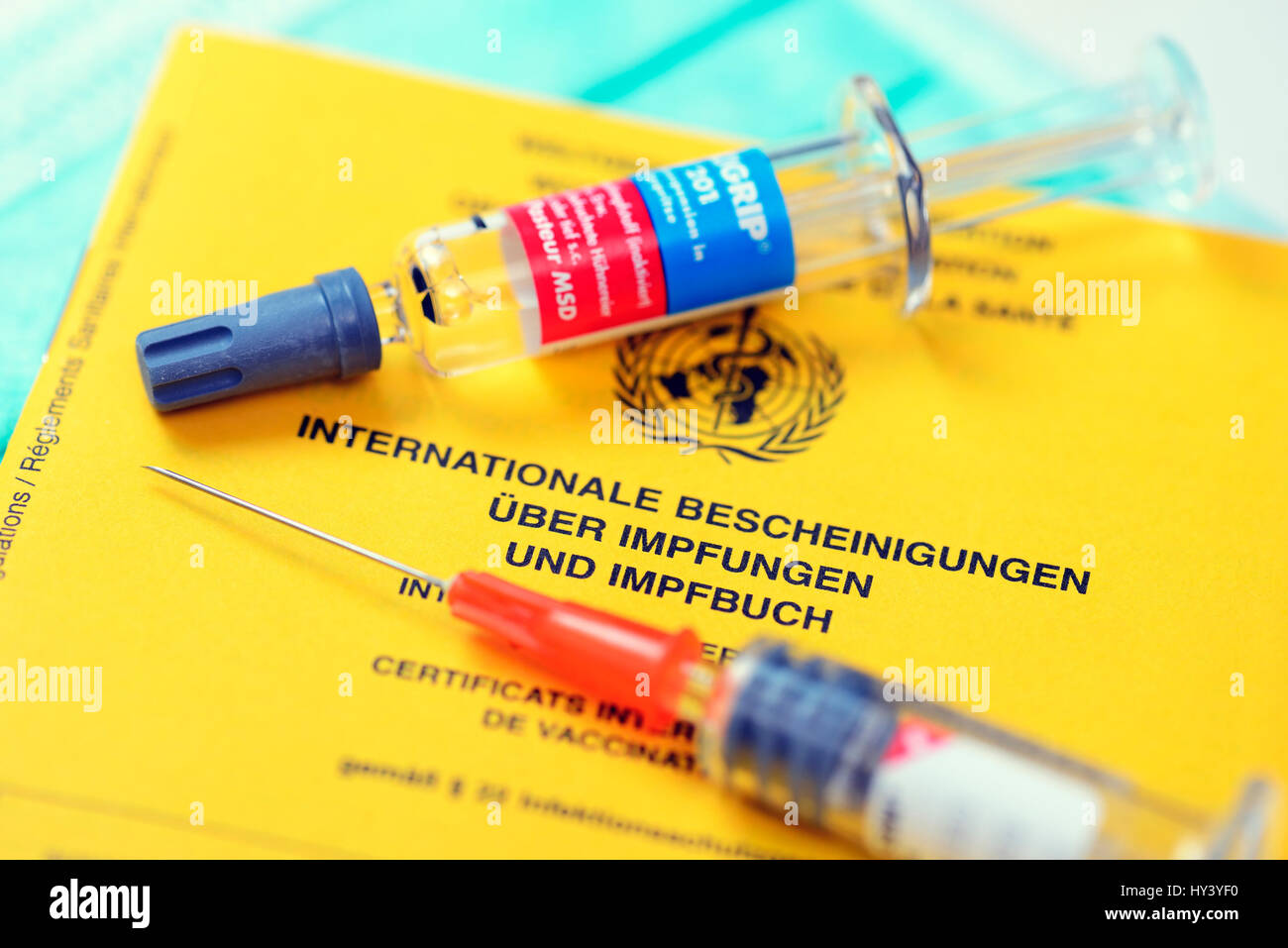 Vaccination identity card and vaccination sputter, Impfausweis und Impfspritzen Stock Photo