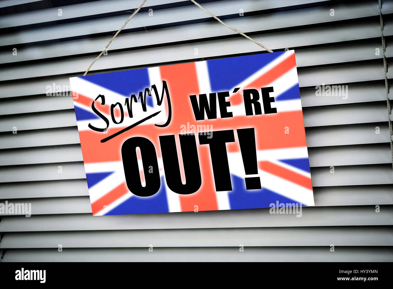 'Sign ''Sorry we?'re out'' with flag of Great Britain, symbolic photo Brexit', 'Schild ''Sorry we´re out'' mit Fahne von Gro?britannien, Symbolfoto Br Stock Photo