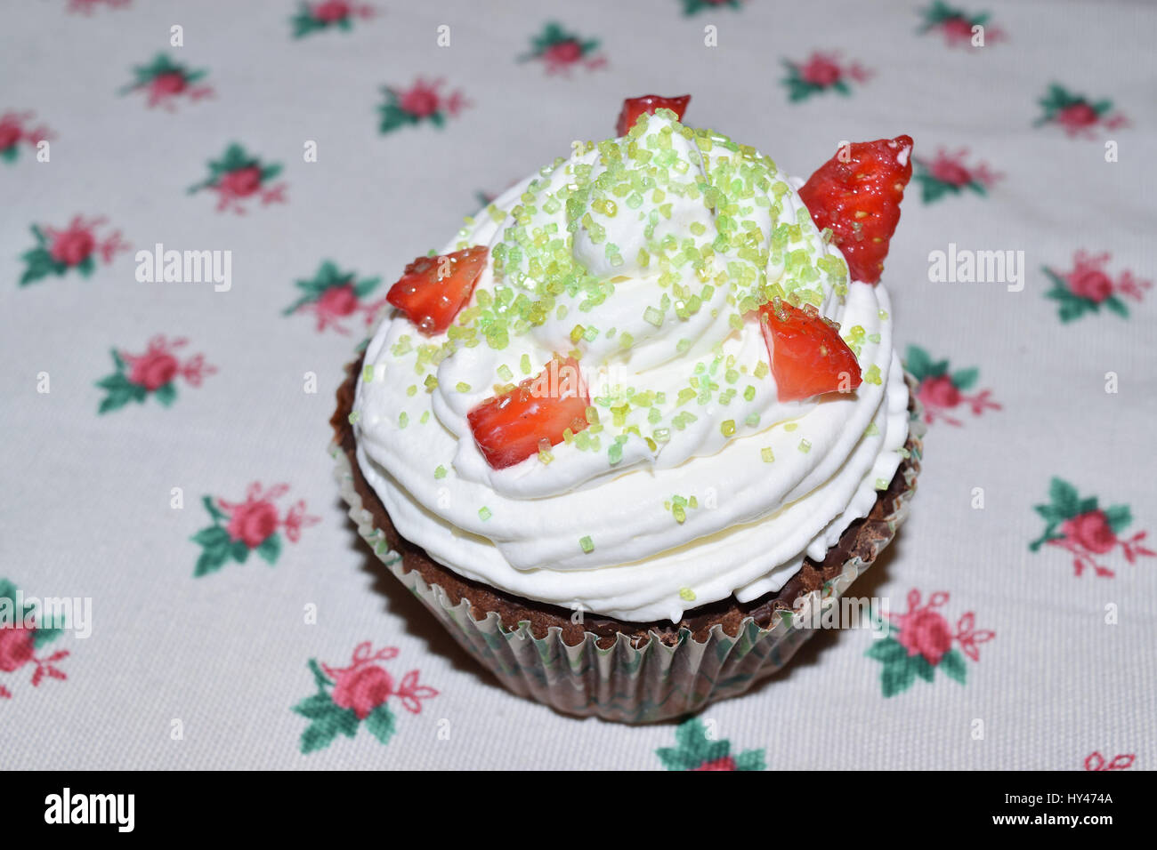 cup cakes with cream and various colorful decorations Stock Photo