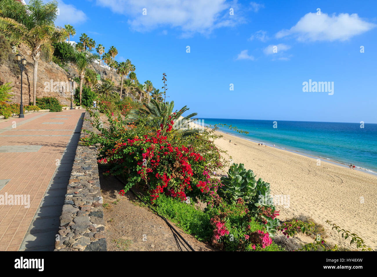 Coastal promenade along sandy beach in Morro Jable town, Fuerteventura, Canary Islands, Spain Stock Photo