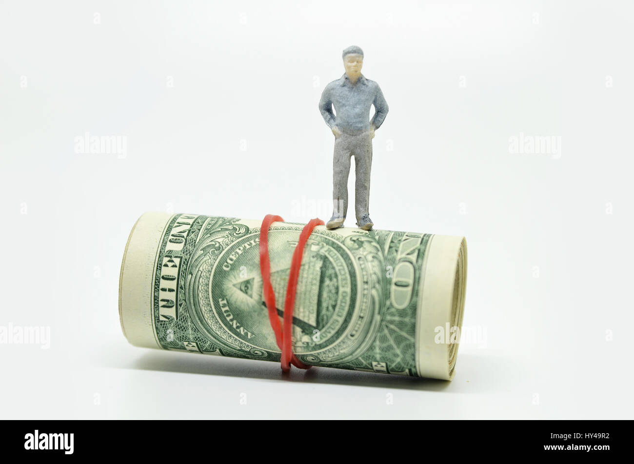 Figure of businessman on one dollar bill Stock Photo - Alamy