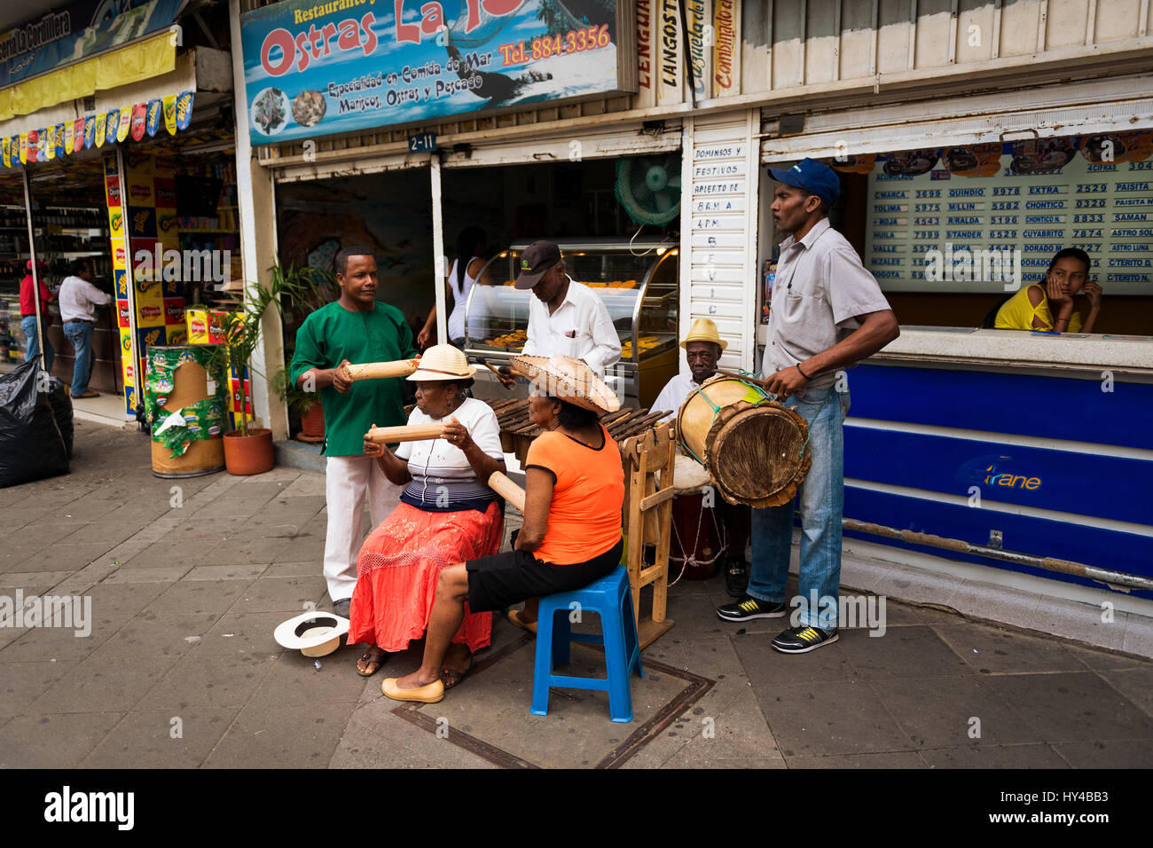 Cali, Colimbia - February 6, 2014: Street musicians playing in a street in the city of Cali, in Colombia Stock Photo