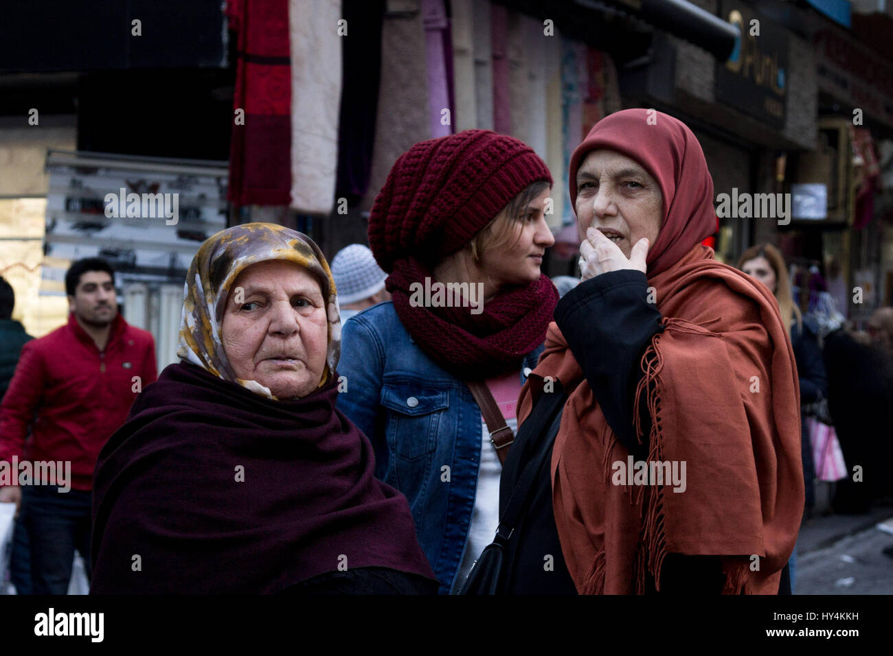 ISTANBUL, TURKEY - DECEMBER 28, 2015: Women wearing islamic headscarf of various ages in the streets of Istanbul  Picture of three different women, of Stock Photo