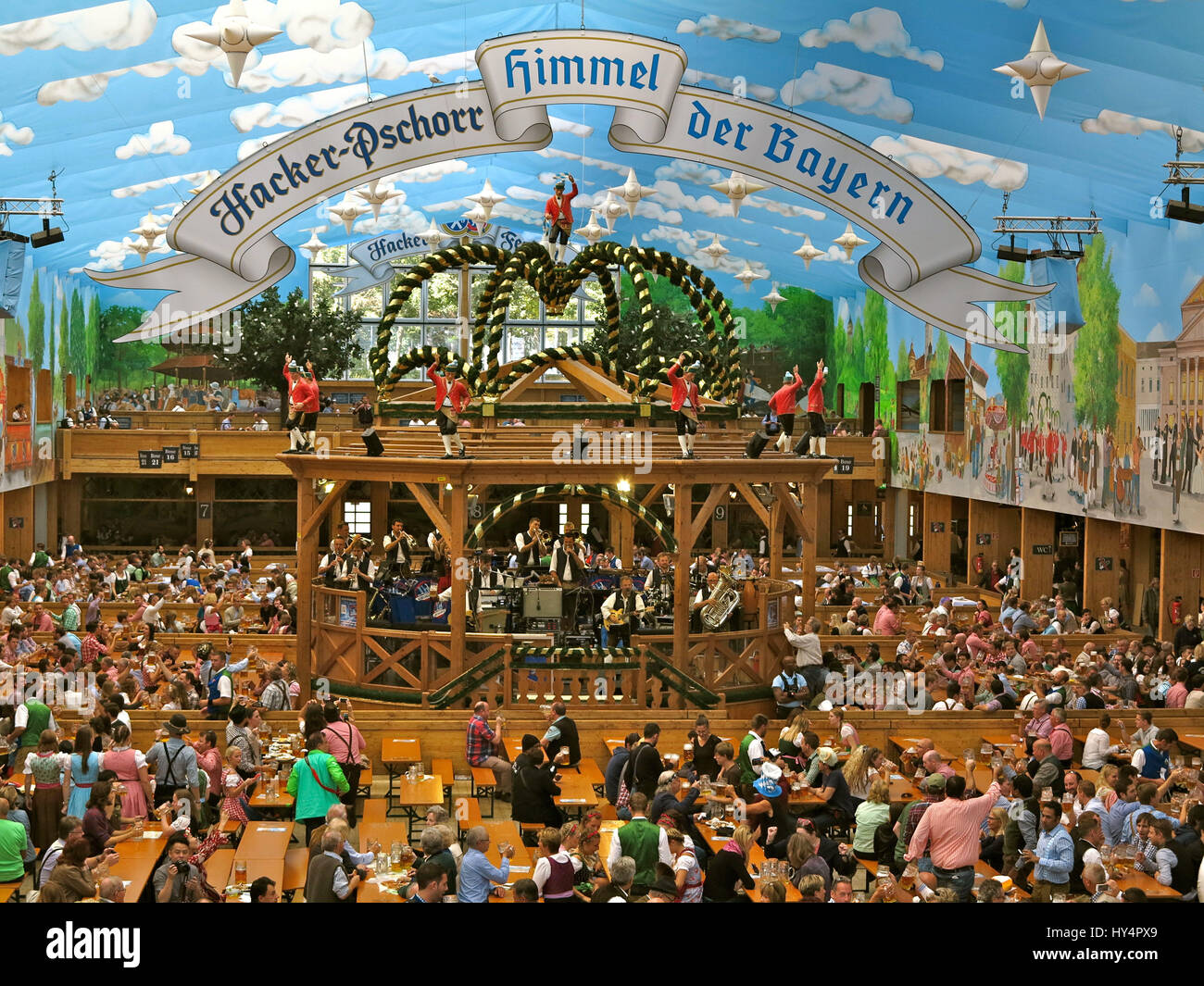Oktoberfest 2016 Hacker-Pschorr Marquee, new painting, sky of Bavaria, Interior, bird's-eye view, Oktoberfest visitors, eat, drink, party, beer mugs, music, chapel, podium with SchÃ¤fflertÃ¤nzern (dancers), Stock Photo