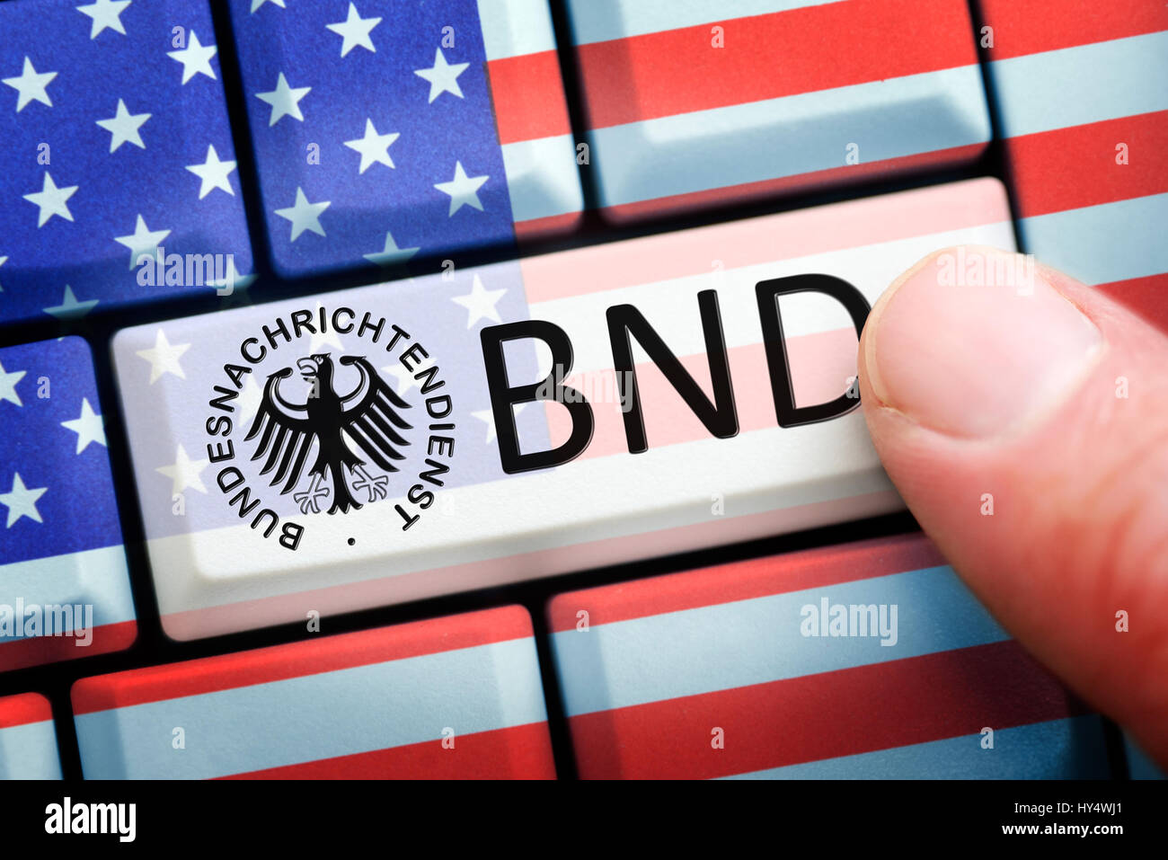 Finger on computer key with Federal Intelligence Service label, symbolic photo Federal Intelligence Service scandal, Finger auf Computertaste mit BND- Stock Photo