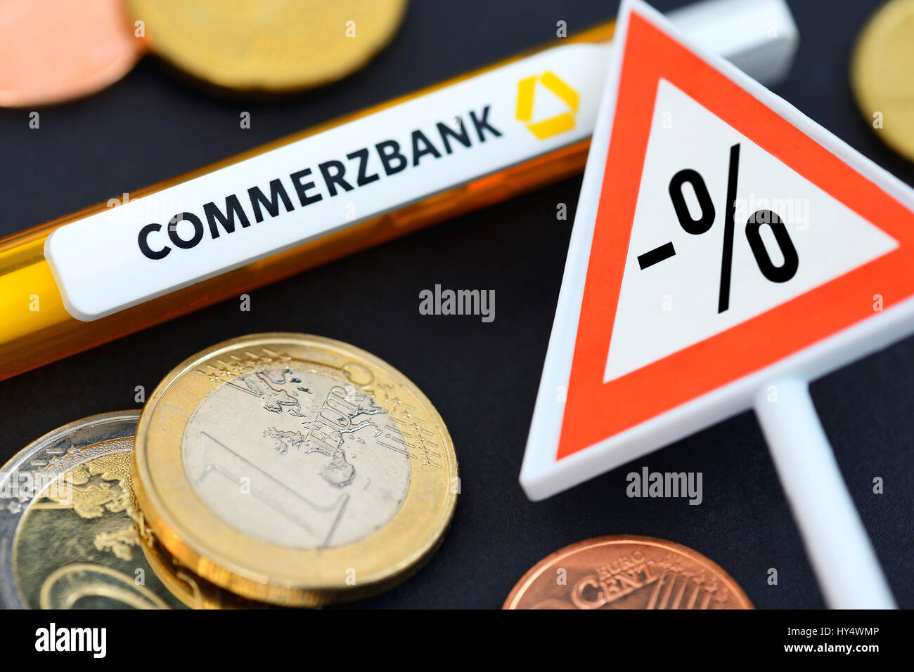 Warning With Negative Percent Sign And Commerzbank Ballpoint Pen 