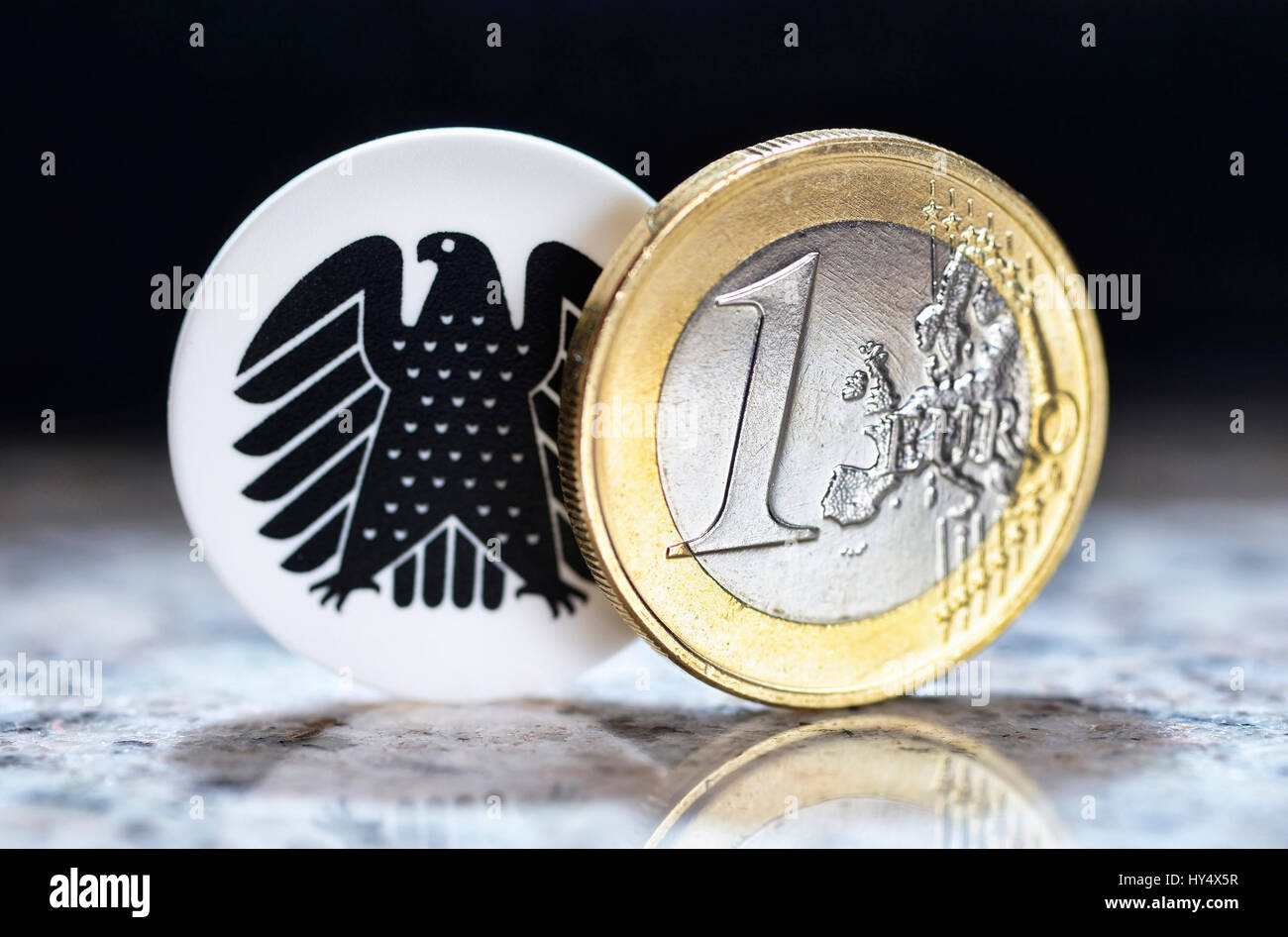 Euro-coin one and federal eagle, parliamentary pay rise, Ein-Euro-Muenze und Bundesadler, Diaetenerhoehung Stock Photo