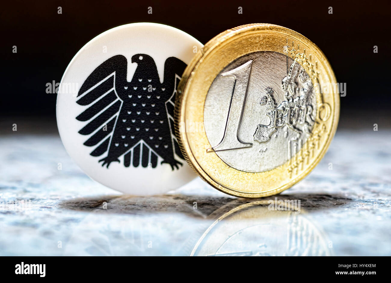 Euro-coin one and federal eagle, parliamentary pay rise, Ein-Euro-Muenze und Bundesadler, Diaetenerhoehung Stock Photo