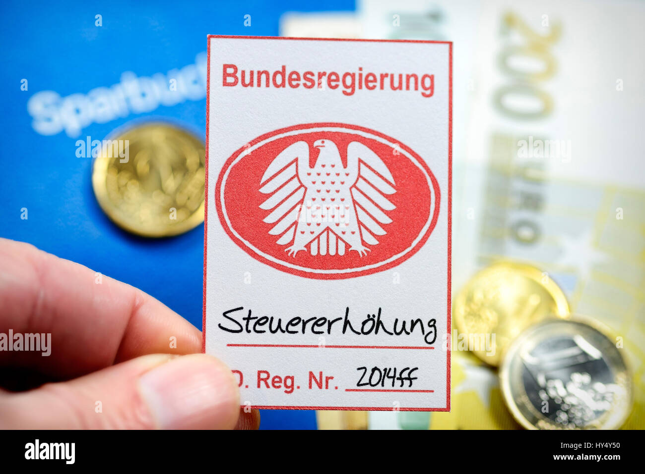 Security seal with federal eagle about bank notes, symbolic photo tax rise, Pfandsiegel mit Bundesadler ueber Geldscheinen, Symbolfoto Steuererhoehung Stock Photo