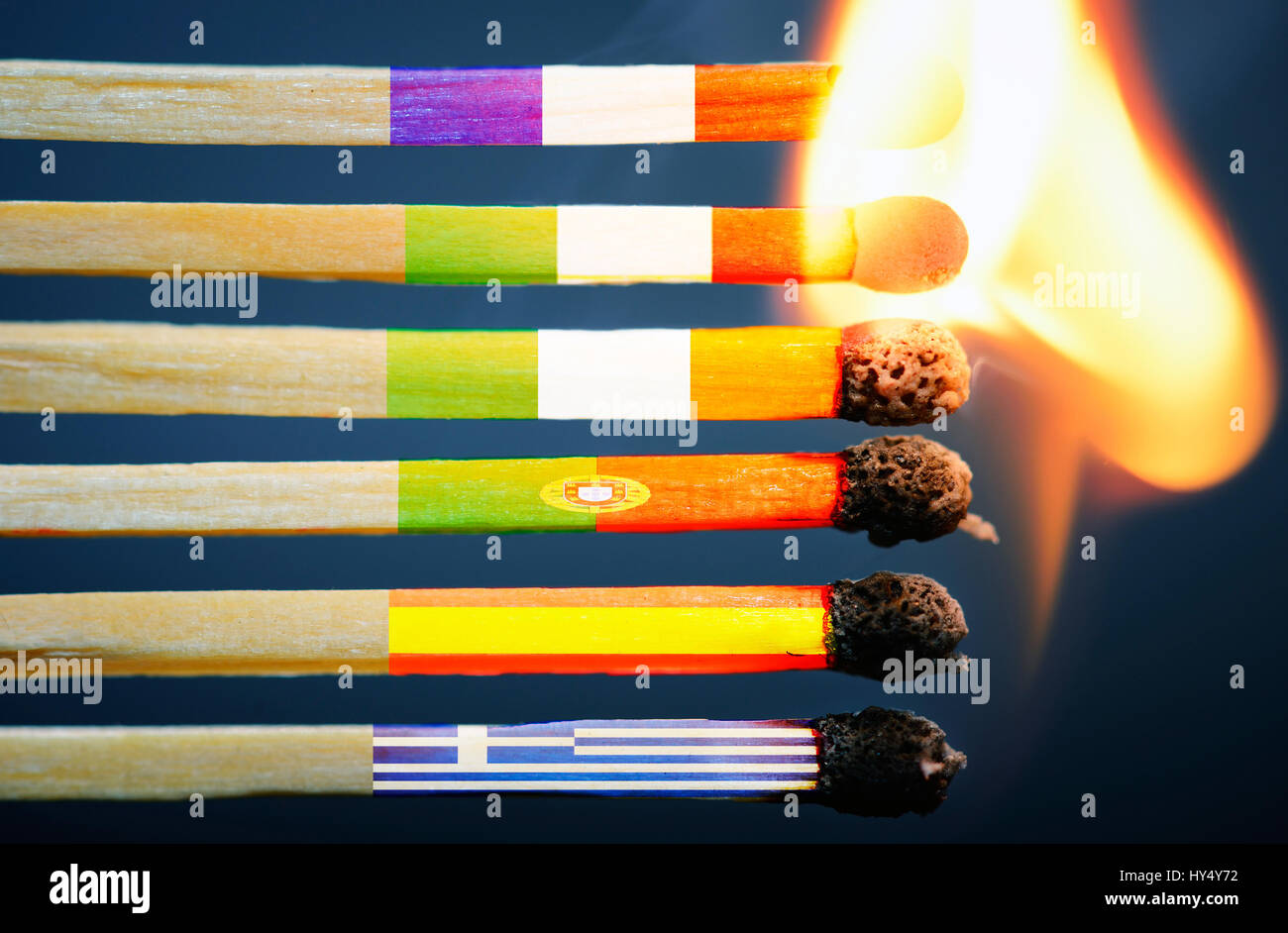 Burning matches with European flags, symbolic photo for chain reaction