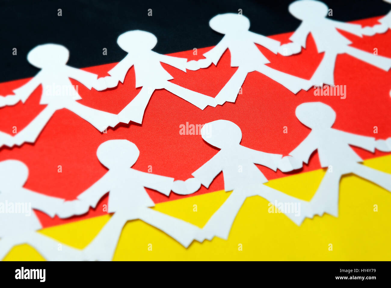 Human chain on Germany flag, symbolic photo popular vote, Menschenkette auf Deutschlandfahne, Symbolfoto Volksentscheid Stock Photo