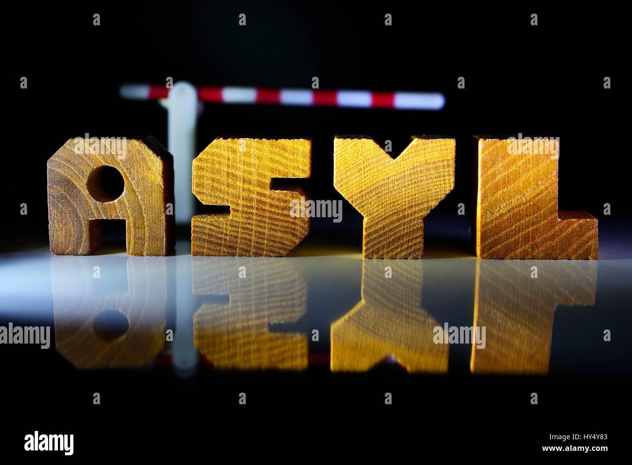 The Word Asylum From Wooden Letter And Tollgate Upper Limit For Refugees Das Wort Asyl Aus 