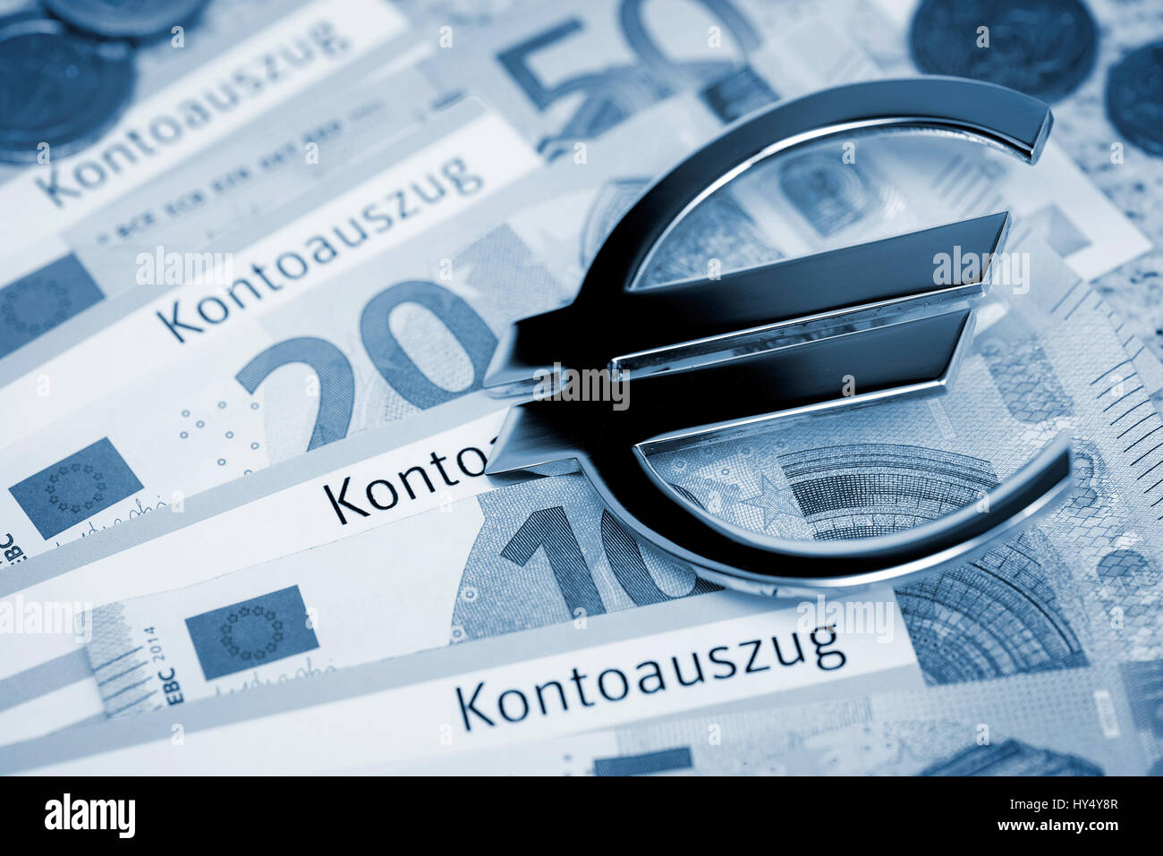 Bank statements and bank notes with eurosign, giro account liable for costs, Kontoauszuege und Geldscheine mit Eurozeichen, kostenpflichtiges Girokont Stock Photo